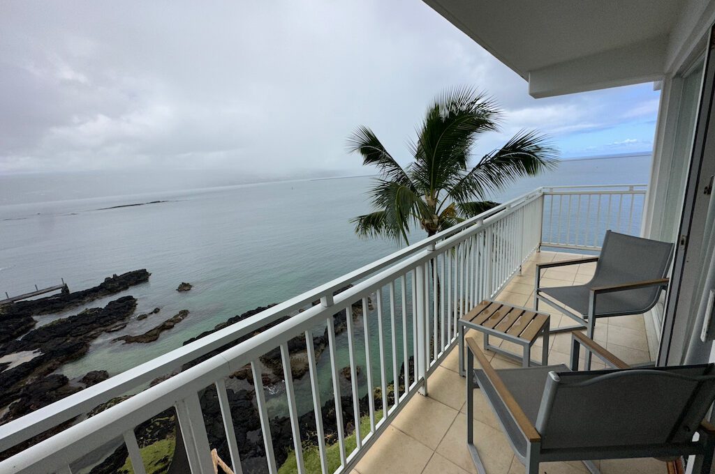 Oceanfront junior suite balcony overlooking ocean at Hilton DoubleTree Hilo